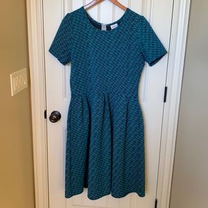 2 Lularoe Amelias - 2x Navy & Green and Peach